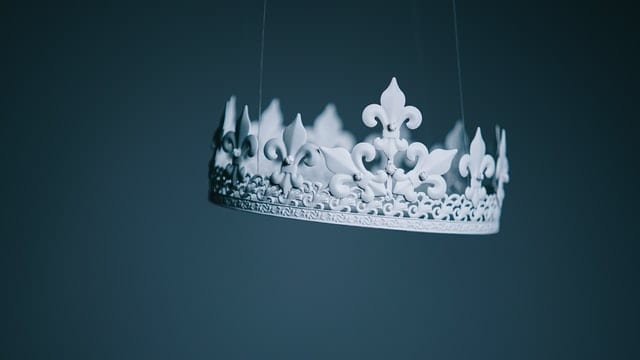 crown on grey background