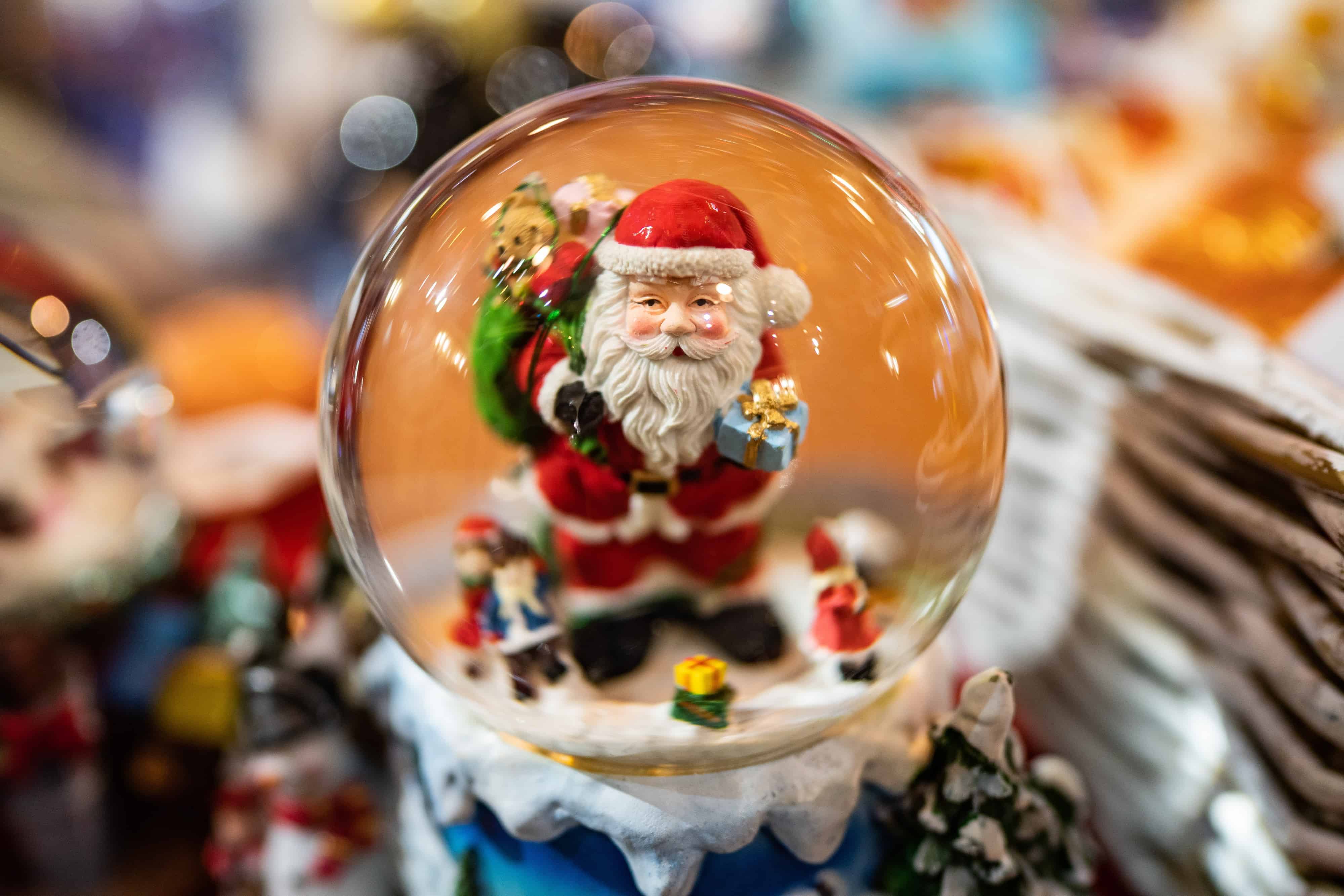 santa in a snow globe