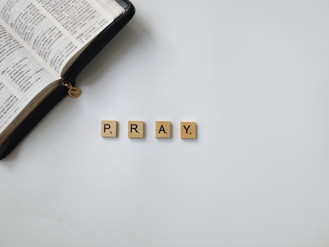 pray - letters on a table