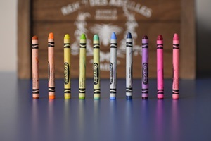 crayons against a wooden background