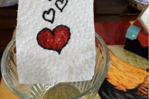 God's love object lesson with heart on paper towel